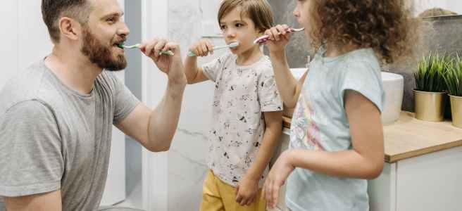 Family Brushing Time After Trick or Treating