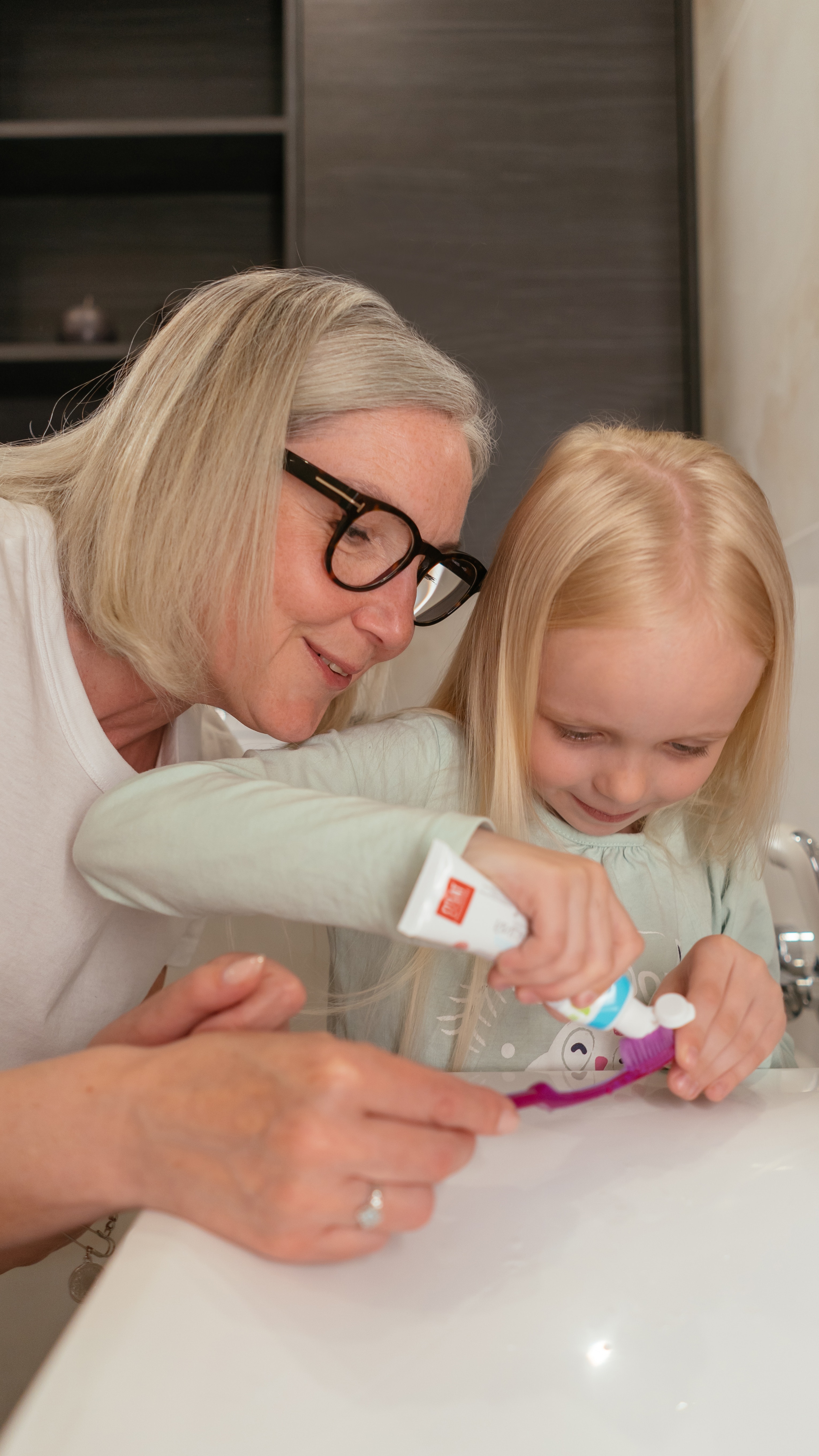 Grandma Is Showing Me How Much Toothpaste Goes On My Brush