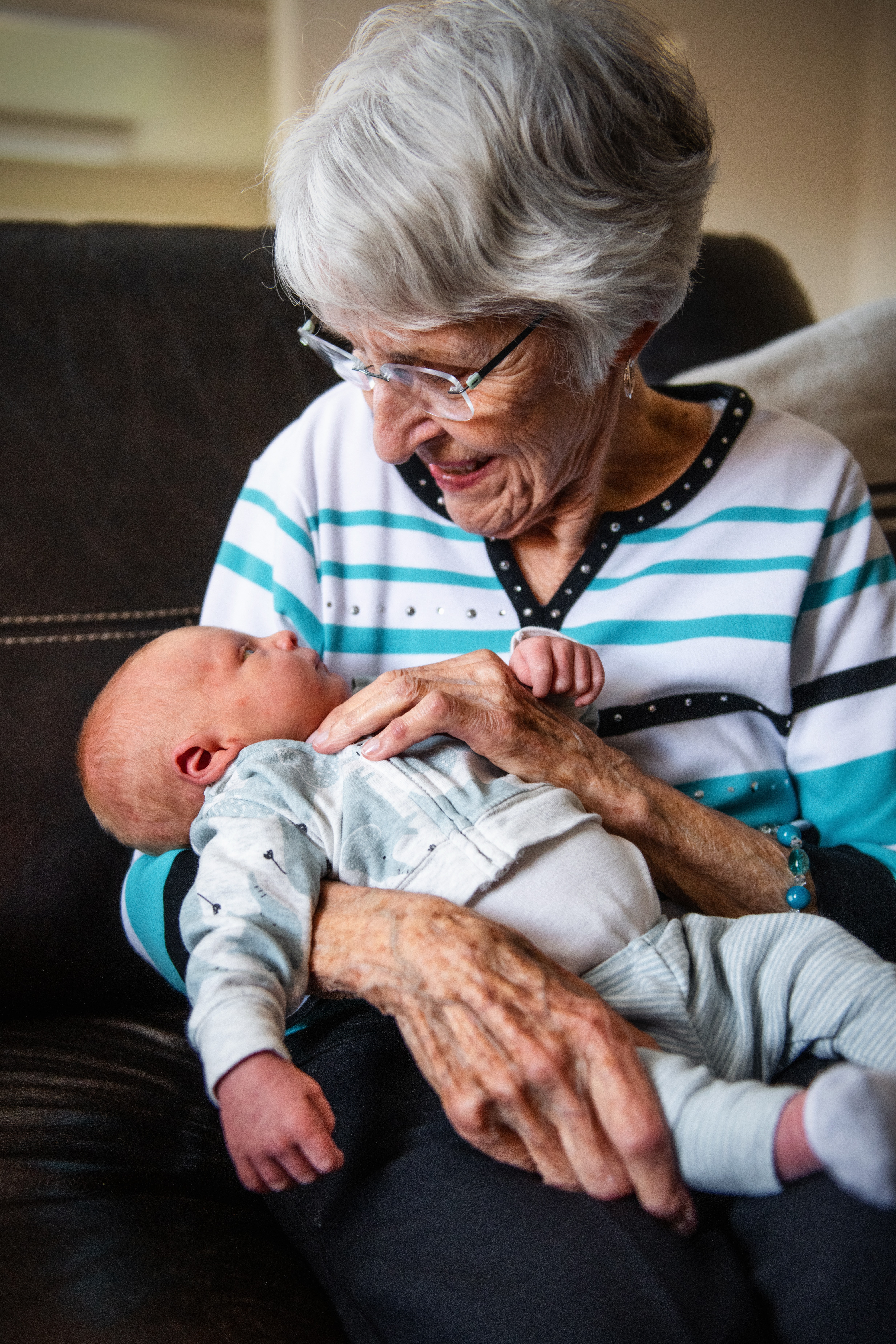 Grandma's checking out my beautiful newborn smile and teeth