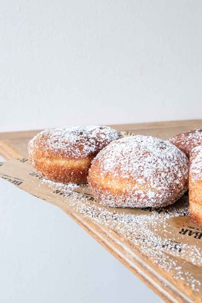 How Much Powdered Sugar Do You Like On Your Jelly Donut?
