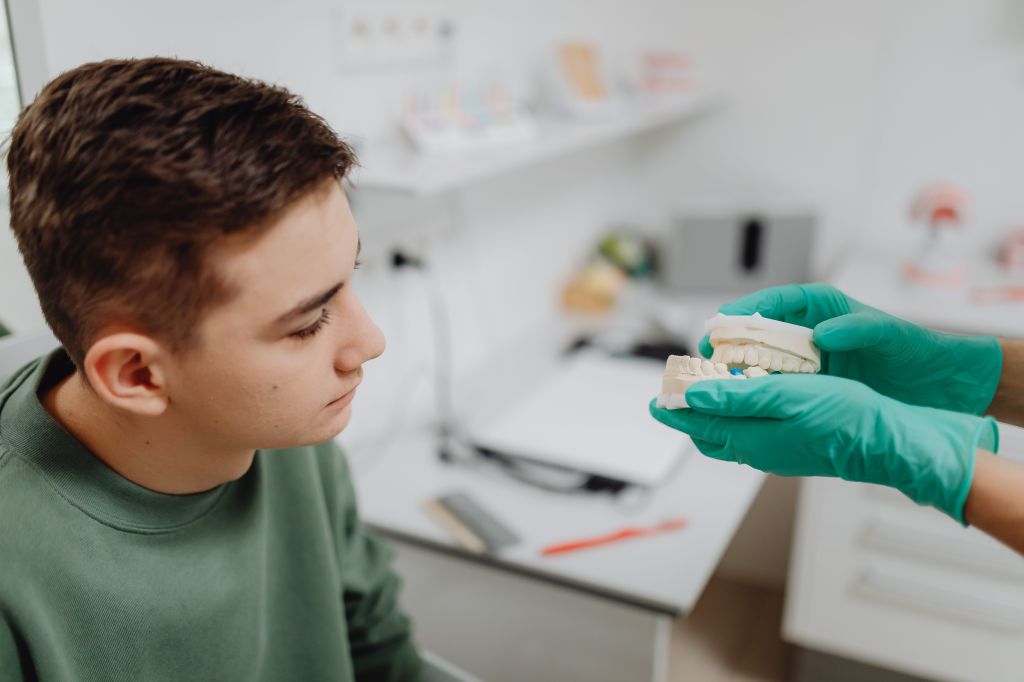 My Dentist Is Explaining Why I Need A Space Maintainer